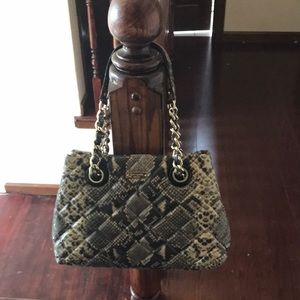Kate spade snake skin patterned handbag.